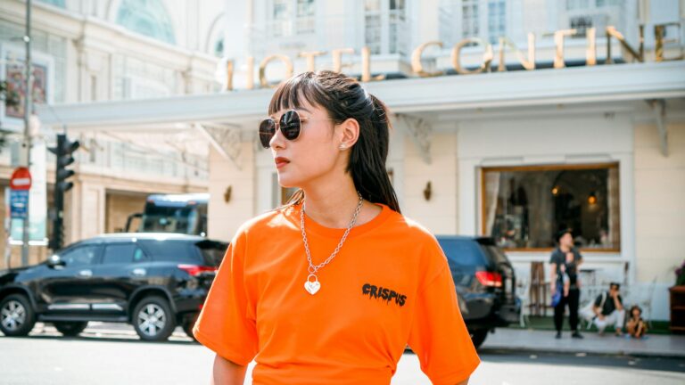 Photo Of Woman Wearing Orange Shirt