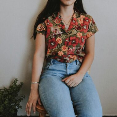 Woman Sitting on Chair Beside Green Plant