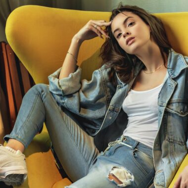 Woman Sitting On Yellow Padded Chair